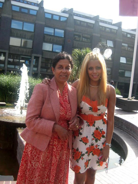 Kumari pictured with her mum Chitrani Mahendran who knifed her in the neck