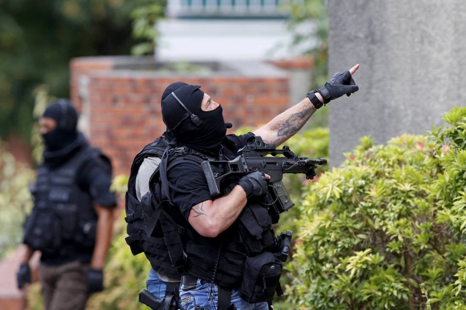 Police shot dead both attackers as they tried to flee the church