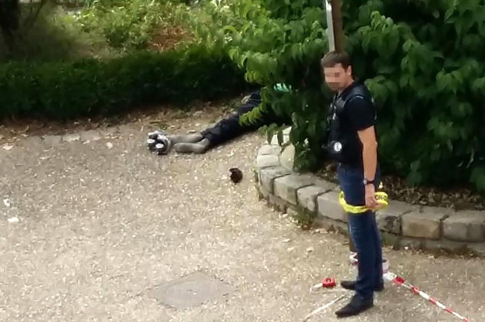Pictures from the scene showed one of the killers dead on the floor after being shot by police in the church's grounds