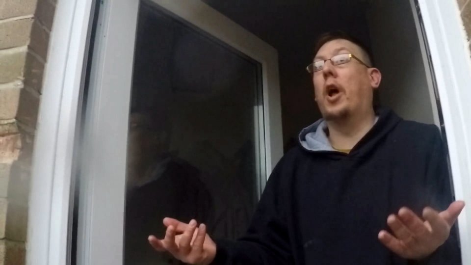 He tells the men he never touched anyone as they shout at him asking why he did what he did