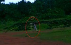 Chilling footage seems to show a 'ghost' following a small child as he walks into a forest