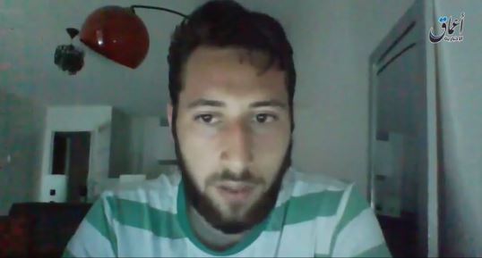 Abdel Malik Petitjean speaks to the camera on French as he urges Islamic extremists to carry out more attacks on France