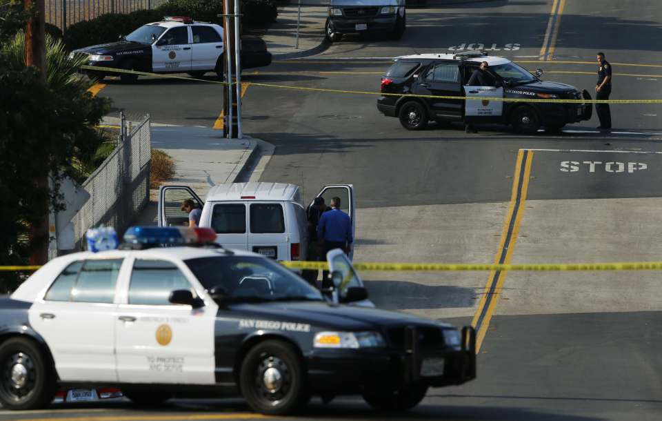 Police investigators arrive near the scene