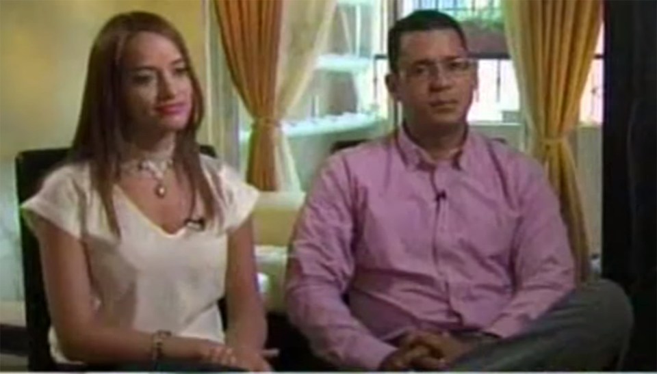 Appearing alongside her husband she told local TV she couldn't be the woman because she had much larger breasts 