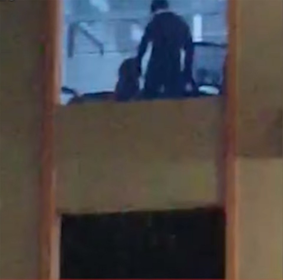 The oblivious couple carried on with the blinds open and were spotted by a teenager playing Pokemon GO
