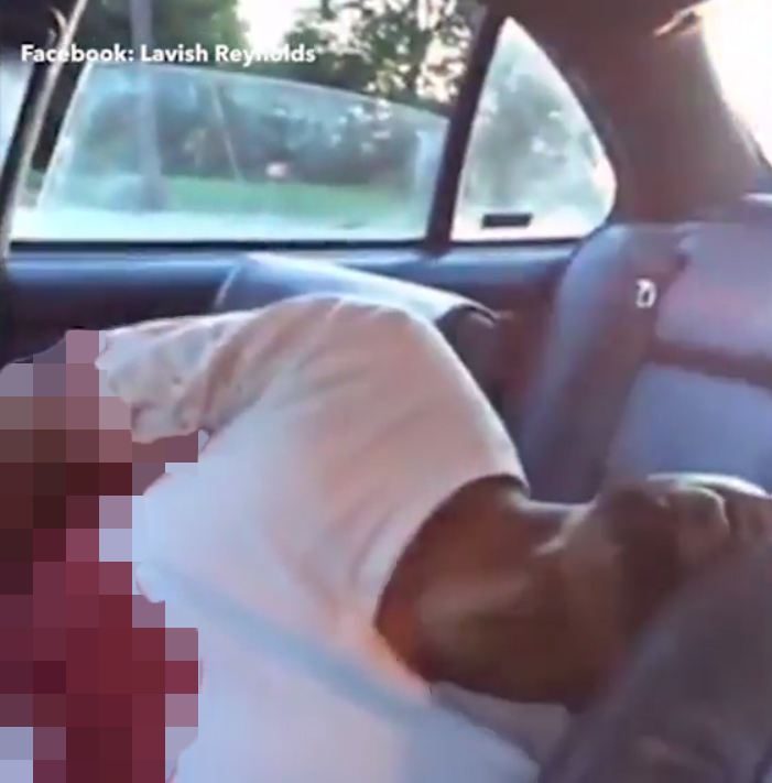 The black man, identified by local media as Philando Castile, can be seen drenched in blood after being shot by Minnesota police