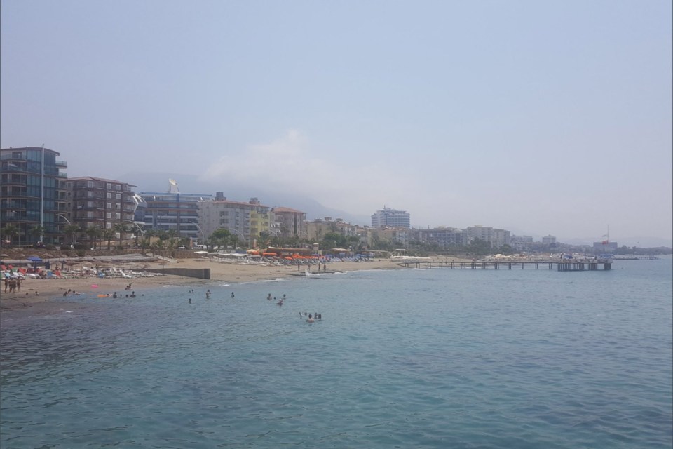This beach was filled with tourists yesterday - but today it lies almost deserted
