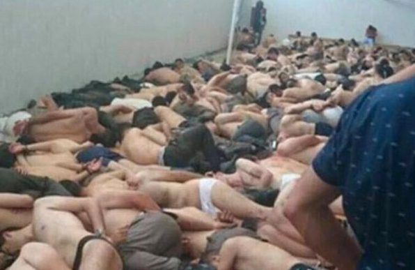 Disturbing images show soldiers bound and on the floor