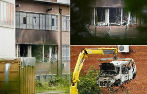 Five arrested after pair ram car into crime lab and torch building to 'destroy evidence'