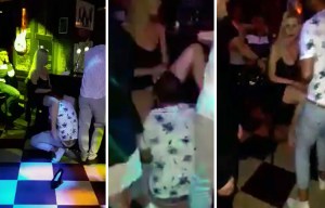 Video shows debauched couple having oral sex in middle of packed Russian nightclub
