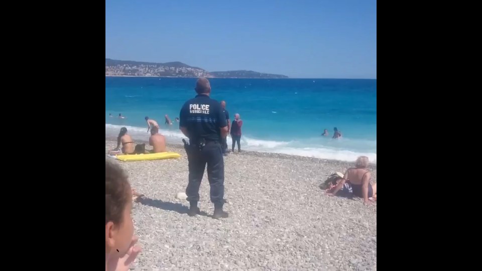 People began shouting at the woman, only known as Siam, telling her to "get out of France"