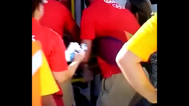 Medics suddenly drop the poor gymnast as the stretcher seemingly slips from their hands