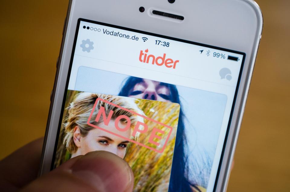 Tinder online dating app on iPhone smart phone