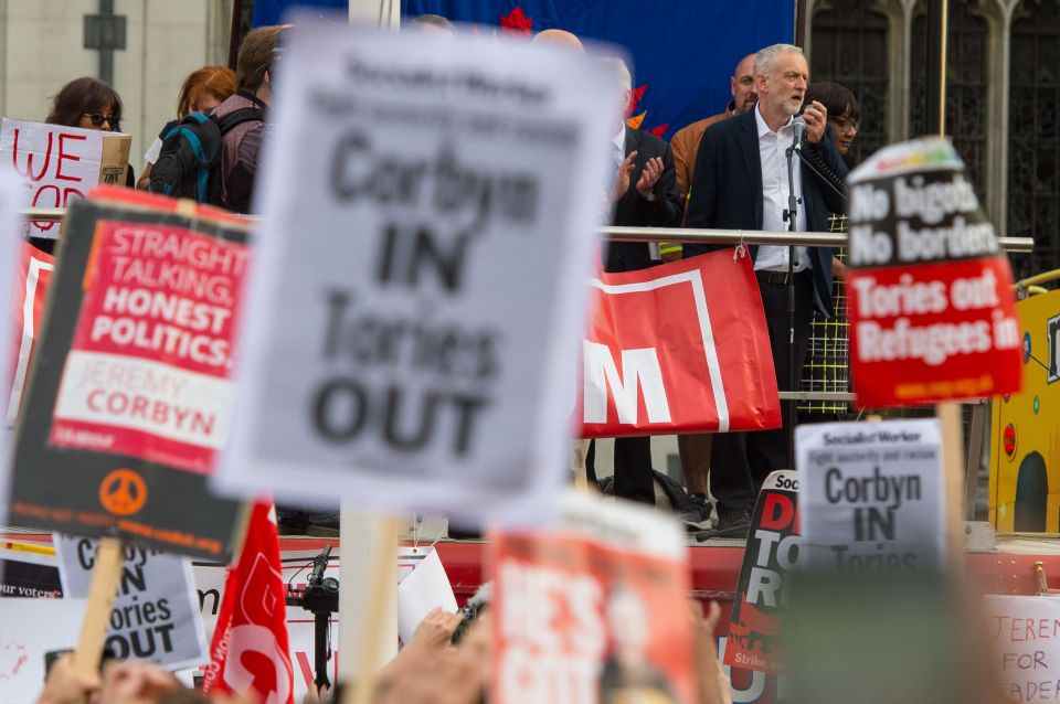 Corbyn speaking at a demonstration organised by Momentum 