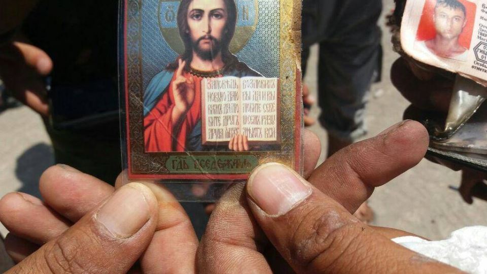 Other pictures posted online appeared to show some of the crew's ID papers alongside religious images