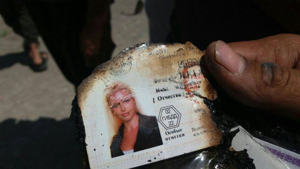 An ID pass recovered from the plane suggested one of the victims was a Russian woman