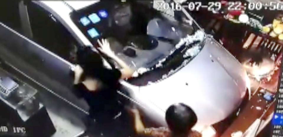 The car, driven by a 17-year-old learner, then reverses back out of the shop