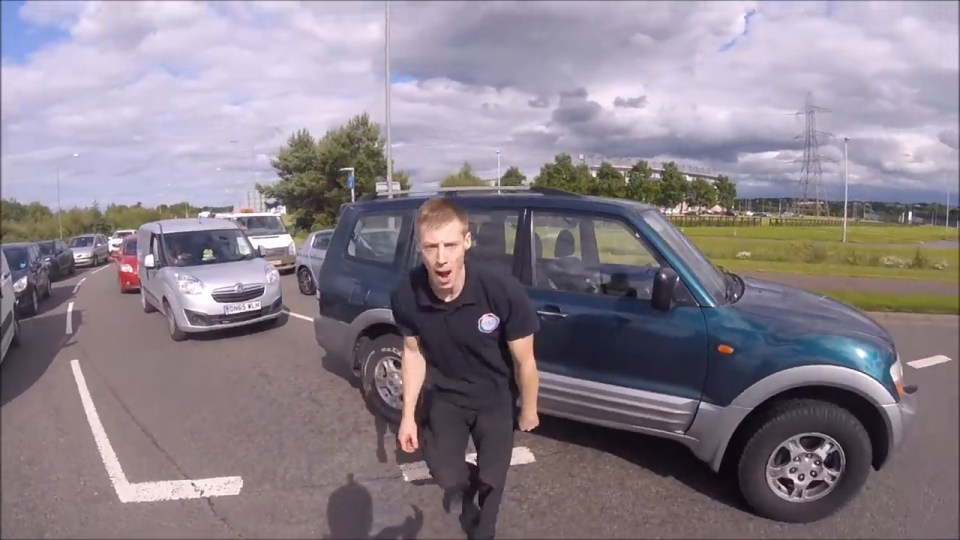 Eventually the driver gets back in his car and leaves the scene