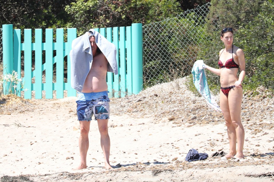 Drying off . . . Sam and David Cameron enjoy fun in the sun in Corsica