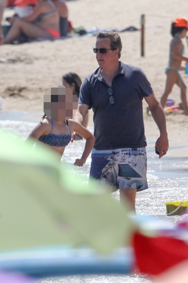 Larking around . . . Cameron enjoys spending time with his kids