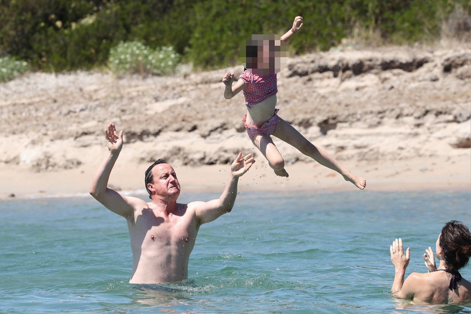 Flabulous time . . . he throws Florence in the air