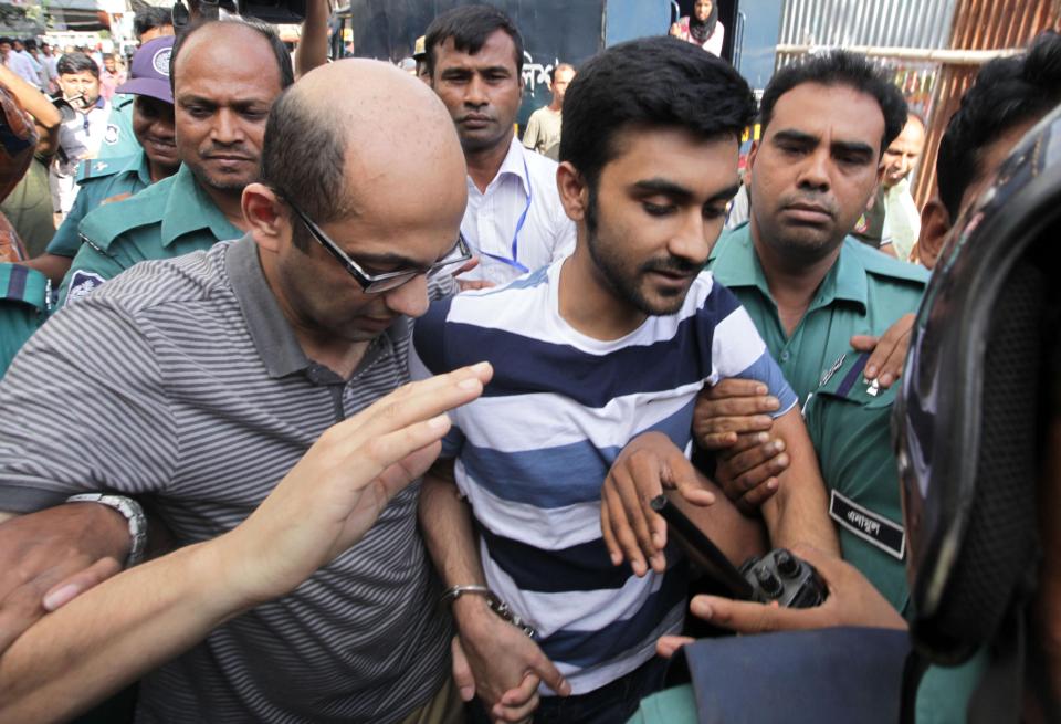 Dhaka,Bangladesh. August 4th, 2016. A¿Hasnat Karim (L), a British citizen of Bangladeshi origin andA¿Tahmid Khan (R), a student at the University of Toronto, in connection with a deadly siege in a cafe in Dhaka lastA¿monthA¿are surrounded by police o