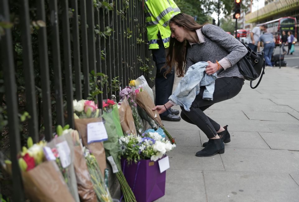 Floral tributes have been left at the scene in central London after the knife rampage earlier this week