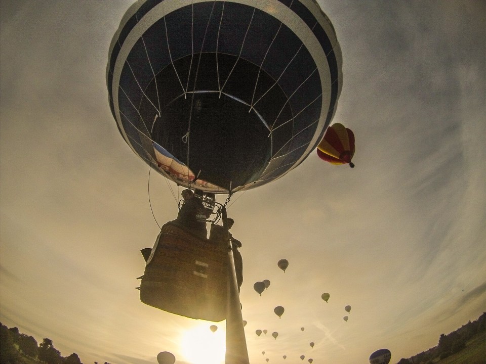 The event is clearly not just for those watching the display on the ground as a pilot takes an epic selfie as his balloon soars into the sky