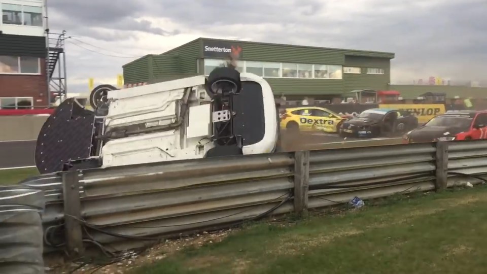It then begins violently barrel-rolling along the edge of the track