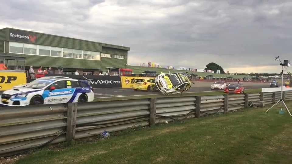 The collision tips the Chevrolet driven by Hunter Abbott onto its side