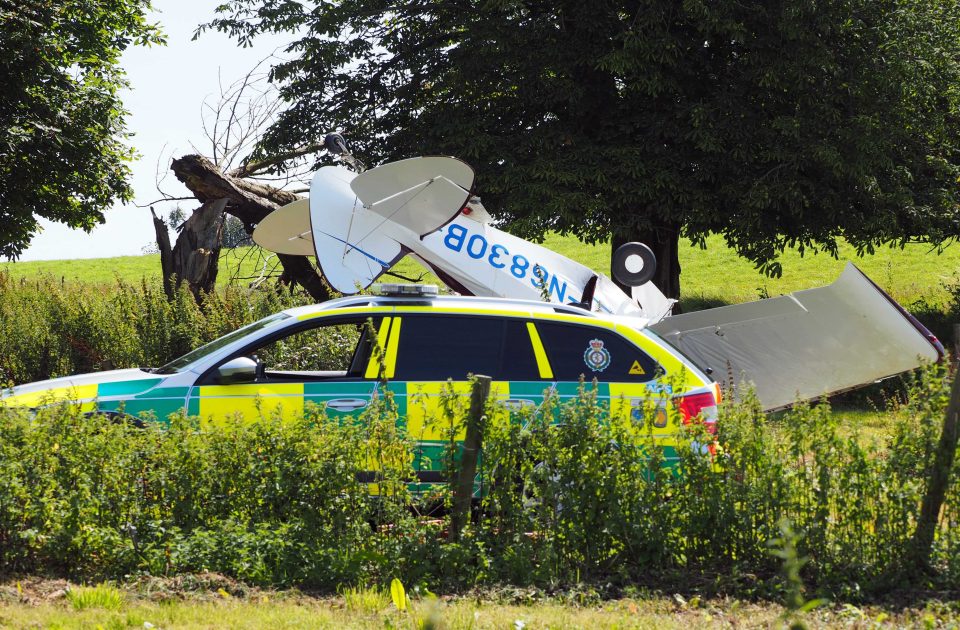 An ambulance is pictured at the scene of the crash where three people were injured