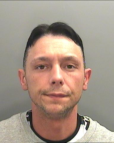 Pal Simon Dooley was with him, wearing a mask, as he threatened the doctor with a screwdriver