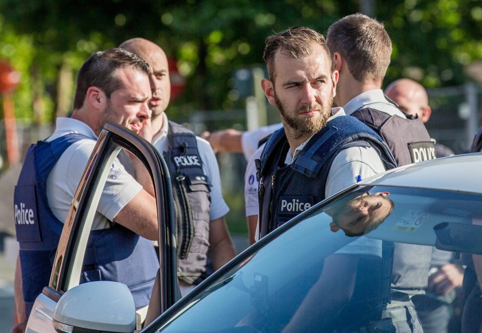 Two Police officers injured by a machete-wielding assailant.