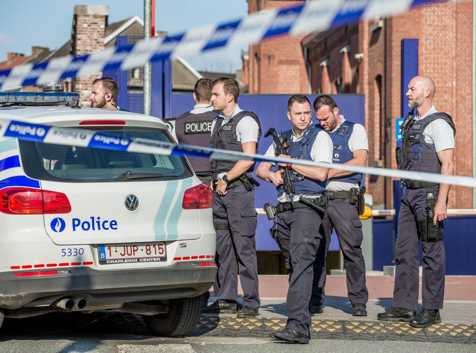 Two Police officers injured by a machete-wielding assailant.