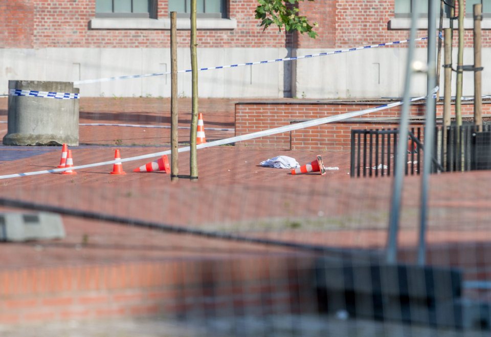 Two Police officers injured by a machete-wielding assailant.