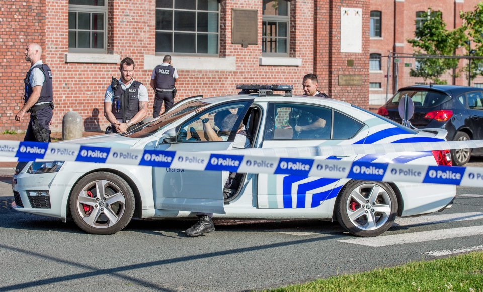Two Police officers injured by a machete-wielding assailant.