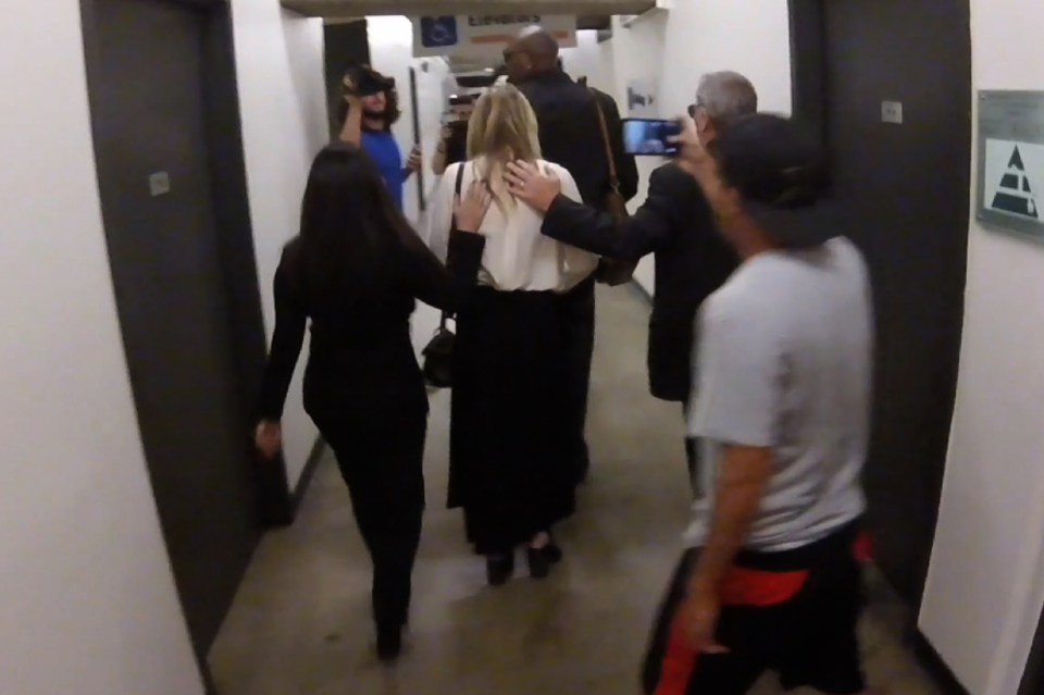 Amber's team herded her inside
