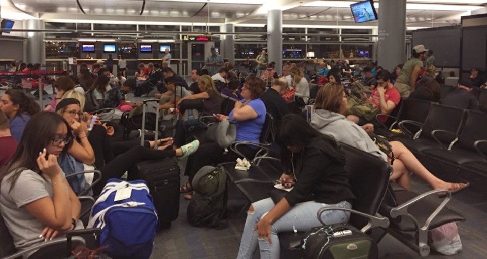 Passengers in the Delta Airlines boarding area at McCarran International Airport in Las Vegas were some of the thousands of travellers left waiting