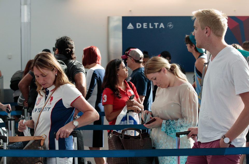 Travellers had their boarding passes written out as the airline attempted to get the flights organised