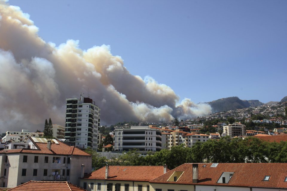 Smoke could be seen billowing out above the hotels and villas of the popular tourist city of Funchal