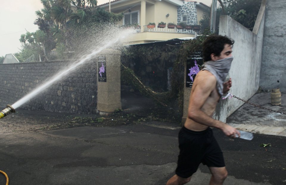People covered their faces with whatever they could to try and protect against the choking black smoke