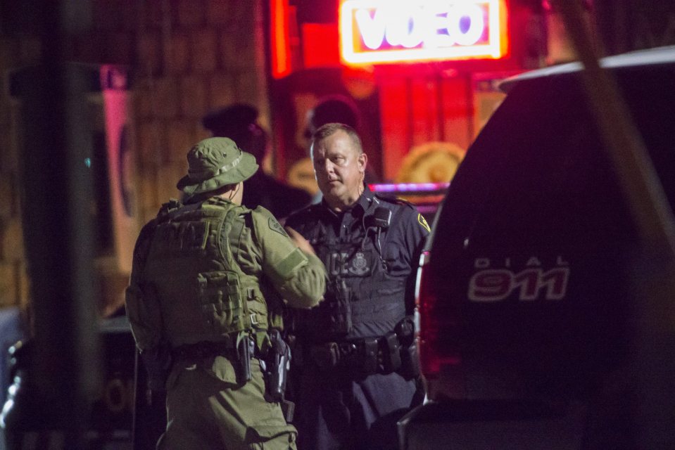 Police, outside a house in Strathroy, Ontario, said they received a 'credible threat' of terrorist activity