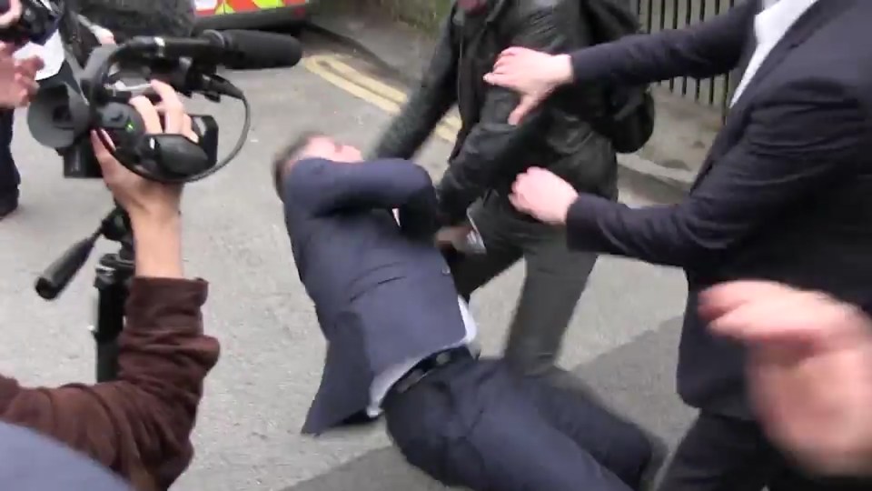 The video shows scuffles braking out at the protest