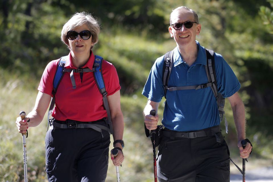 Theresa May and her husband Philip are enjoying themselves on holiday