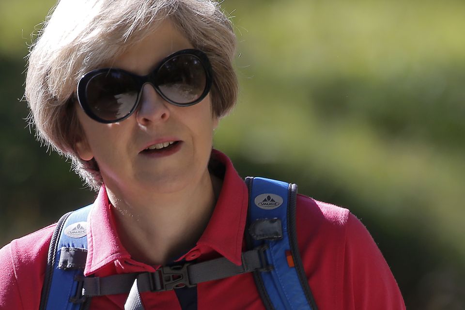Theresa May wears dark sunglasses