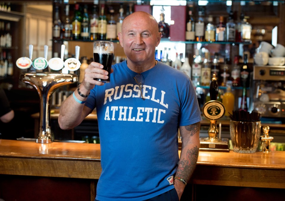 Cheers! . . . Pat is thrilled to toast his freedom and return to normal life 