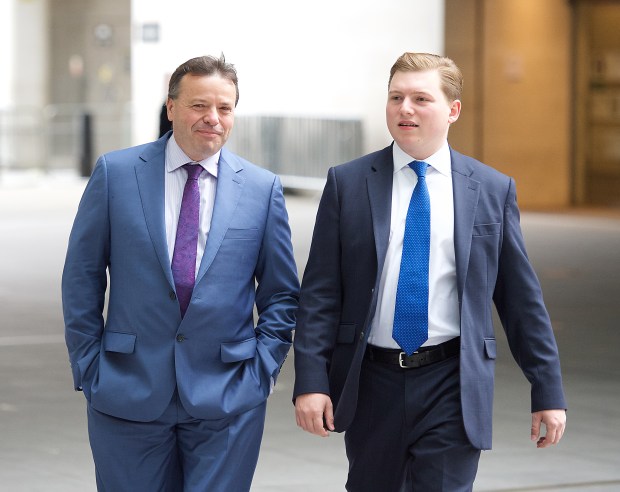 Cottrell (right) was arrested last month while leaving the US with Mr Farage