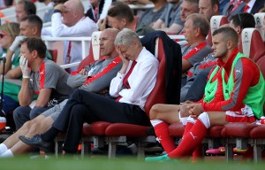 Arsene Wenger admits Arsenal aren't physically ready for the new season as two players injured in defeat