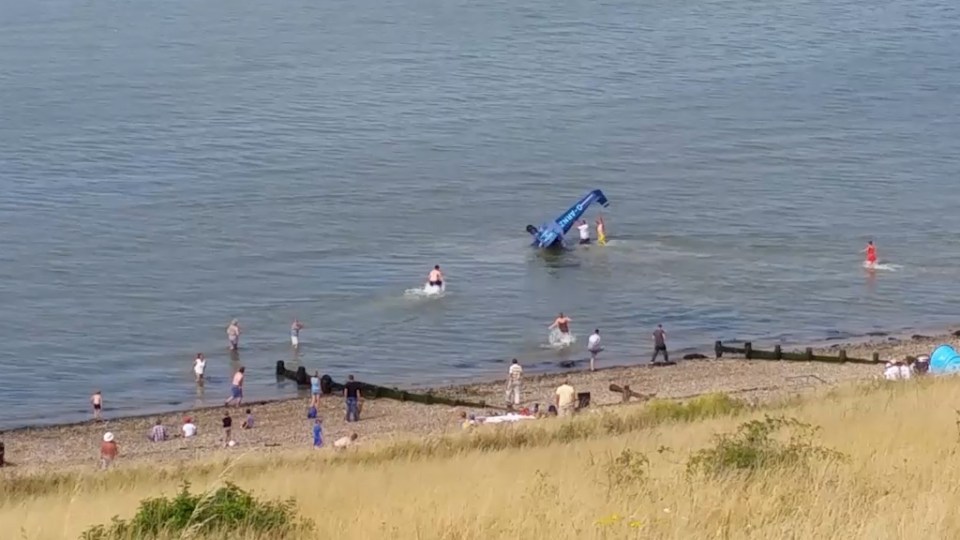 Eyewitnesses captured the dramatic scenes on camera as the plane nose-dived into the water