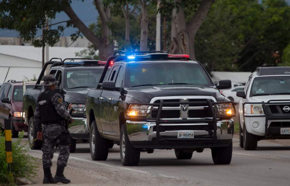 Jalisco state police patrol city streets after the brazen kidnapping raised tensions in the popular tourist area